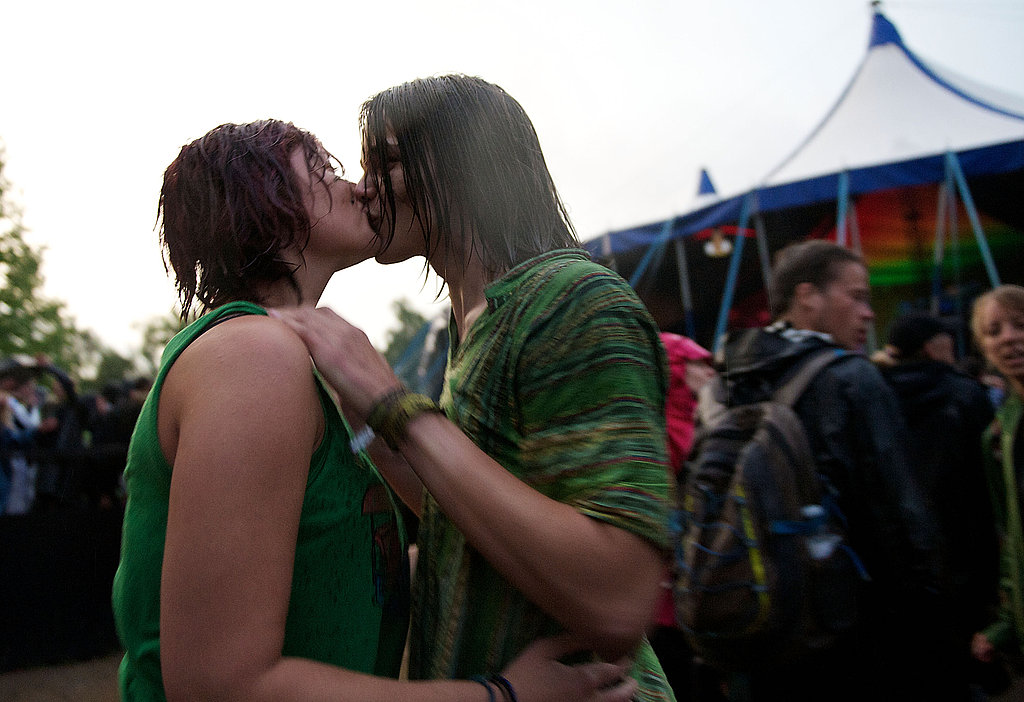 Aww, how romantic! A couple kissed in the rain at Roskilde Festival in Roskilde, Denmark.
