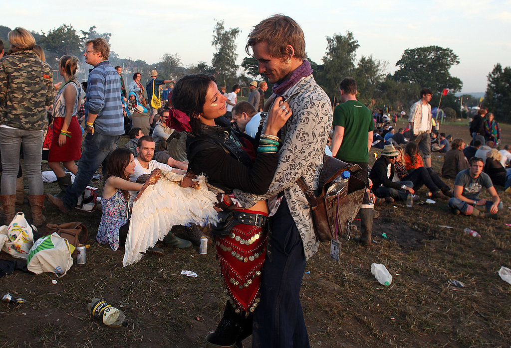 Rise and shine! A couple held each other during sunrise at the Glastonbury festival.
