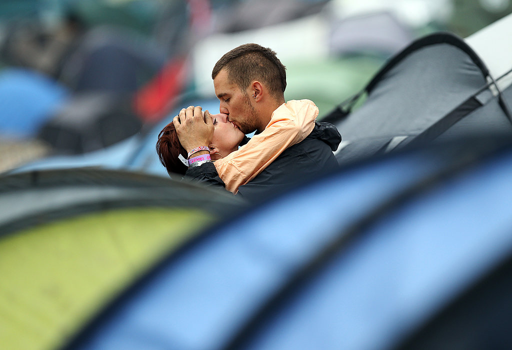 This kissy couple hid among the tents at the Glastonbury festival in the UK.
