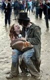 Glastonbury festivalgoers goofed off in the mud.
