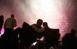 This pair enjoyed the fireworks at Glastonbury Abbey Musical Extravaganza in England.
