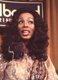 Donna Summer takes in the 1977 Bilboard Music Awards. 
