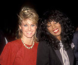 Olivia Newton-John and Donna Summer enjoy themselves at the  Dreamgirls opening night in 1983. 
