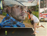 A woman kissed a picture of country singer Jason Aldean at the 2012 Downtown Hoedown at Comerica Park in Detroit.
