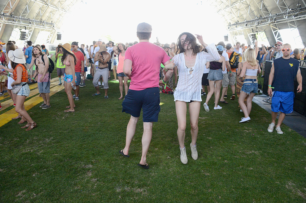 A guy and girl danced together at Coachella.
