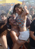 A twosome got wet in the Coachella crowds.
