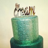 Metallic cake topper at The Cream.
