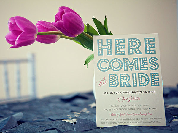 In keeping with the theme, these Minted invitations feature marquee-style lettering.
Photo by Serendipity Studios
