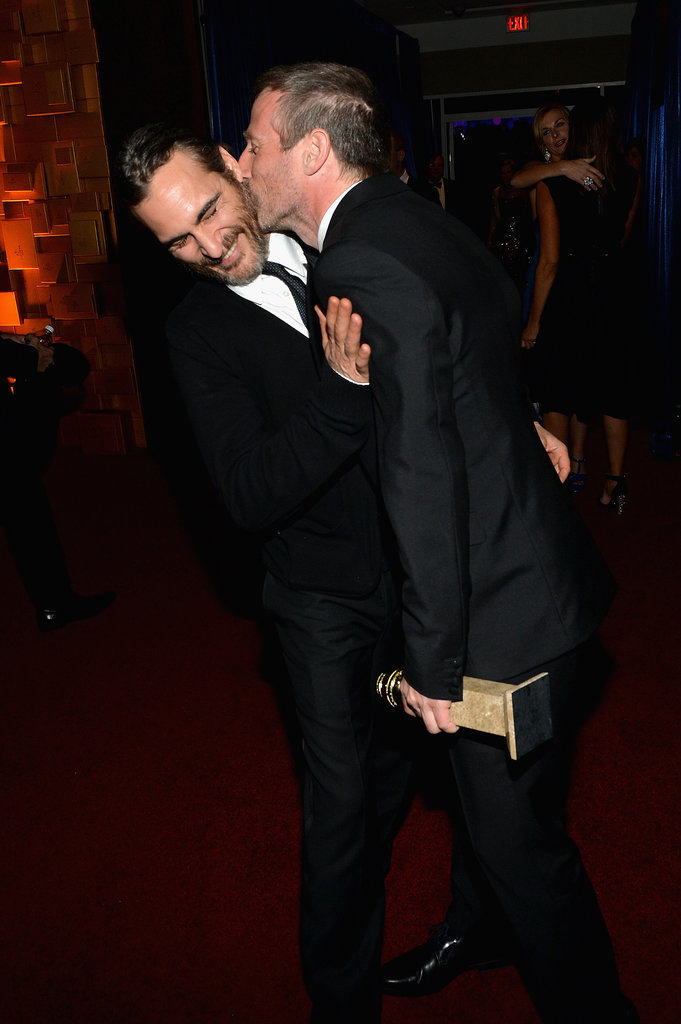 Spike Jonze kissed Joaquin Phoenix at a Golden Globes afterparty.
