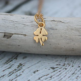 Gold four-leaf clover pendant ($28-$40)
