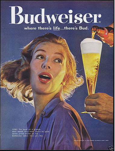 In 1960, this young woman couldn't keep her eyes off the beer. 
