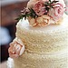 There's something so sweet about this simple but beautiful cake — the ruffles and flowers make a perfectly classic combo. 
Photo by Oh, Darling! via Wedding Chicks